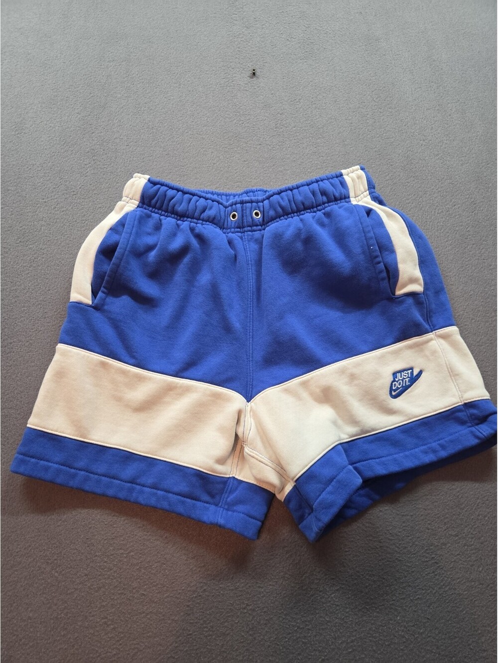 men's/unisex blue & white sweatshorts w/ no drawstring by Nike size S